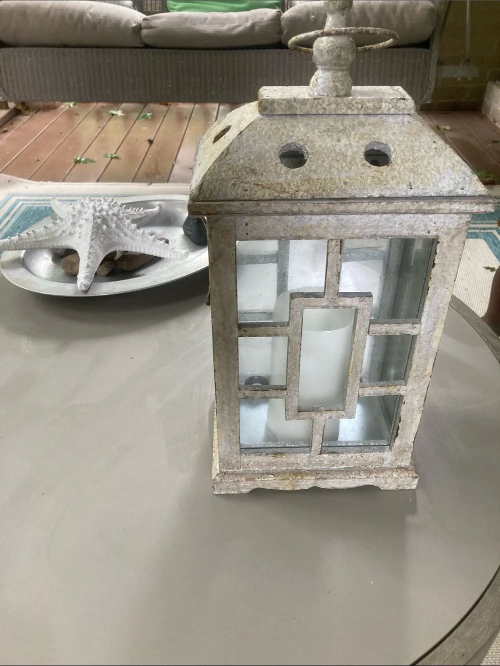 Wood and glass paned porch lantern with battery operated wax candle